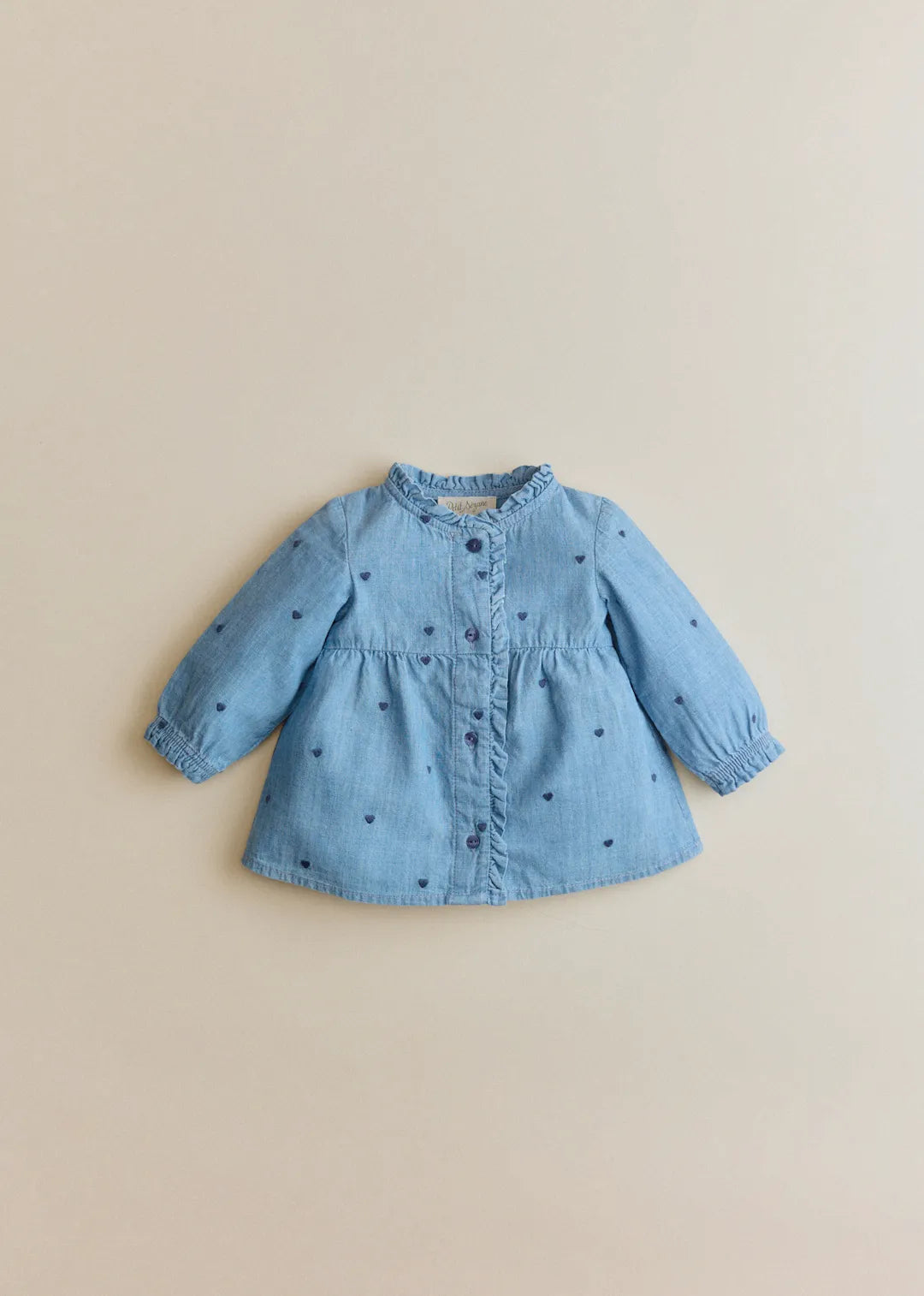 Chambray with embroidered navy hearts