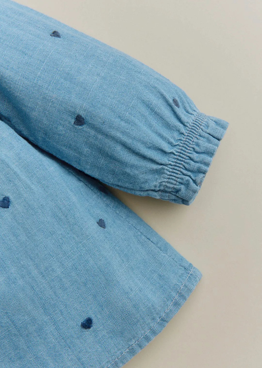 Chambray with embroidered navy hearts
