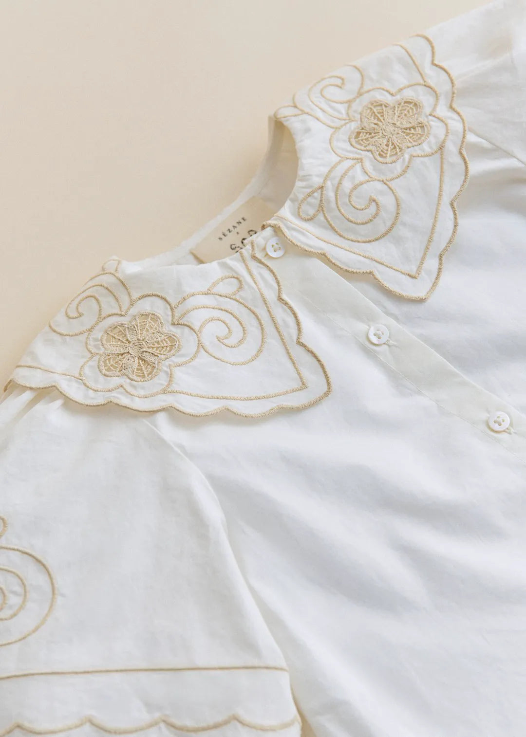 Placed Ecru Embroidery
