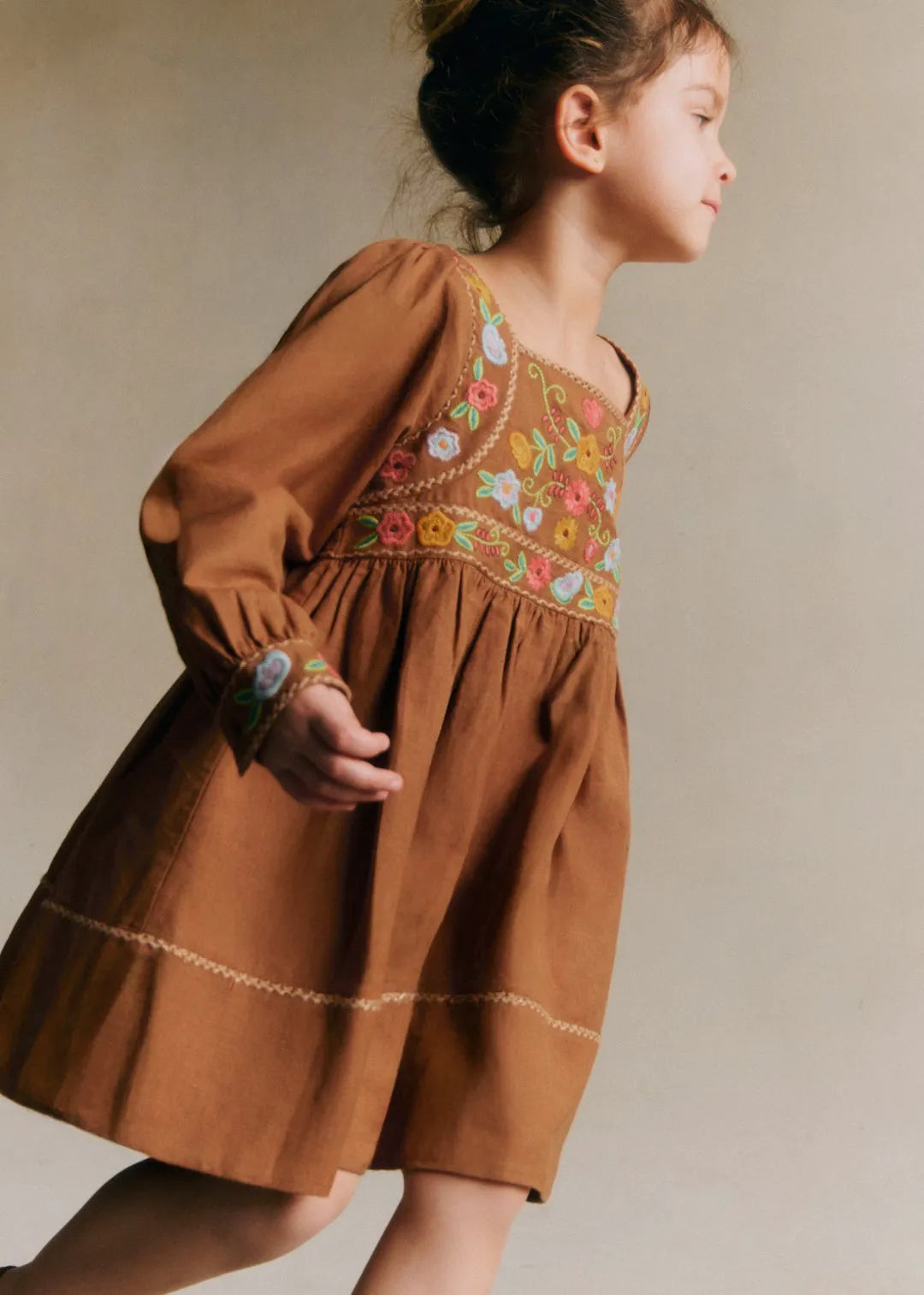 Contrasting Embroidery Brown Background