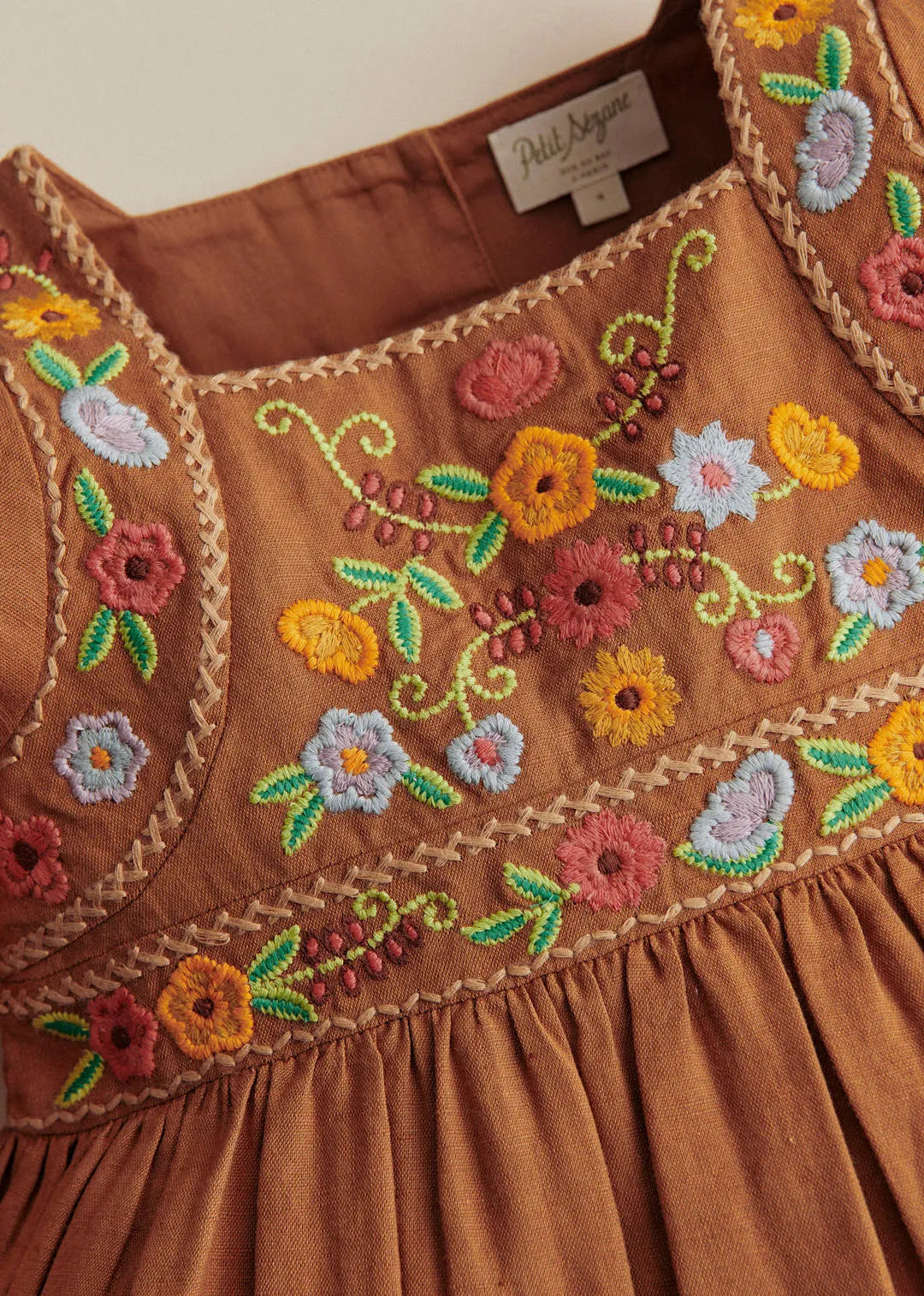 Contrasting Embroidery Brown Background