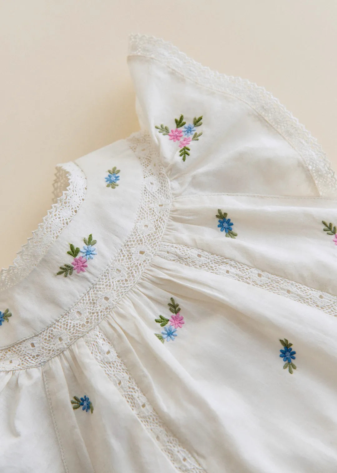 Placed Multicolored Flowers Embroidery On Cream