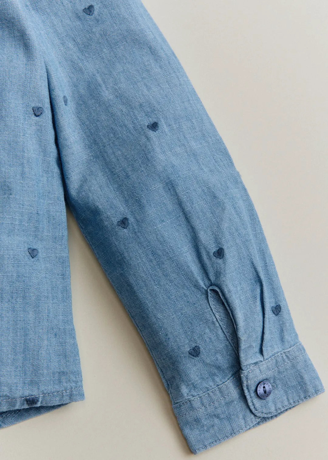 Chambray with embroidered navy hearts