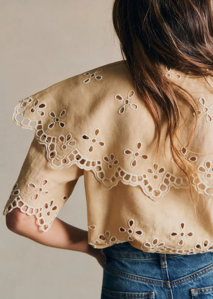 Contrasting Ecru Embroidery Beige Background