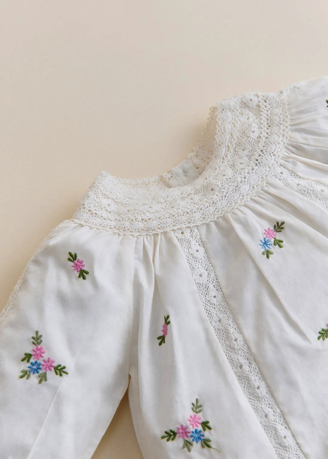 Placed Multicolored Flowers Embroidery On Cream