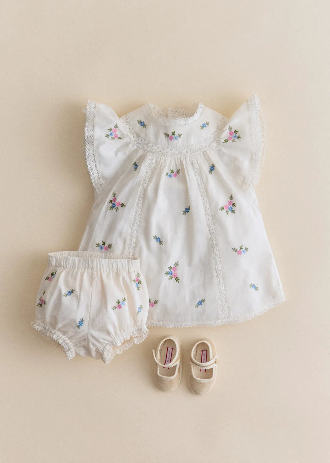 Placed Multicolored Flowers Embroidery On Cream